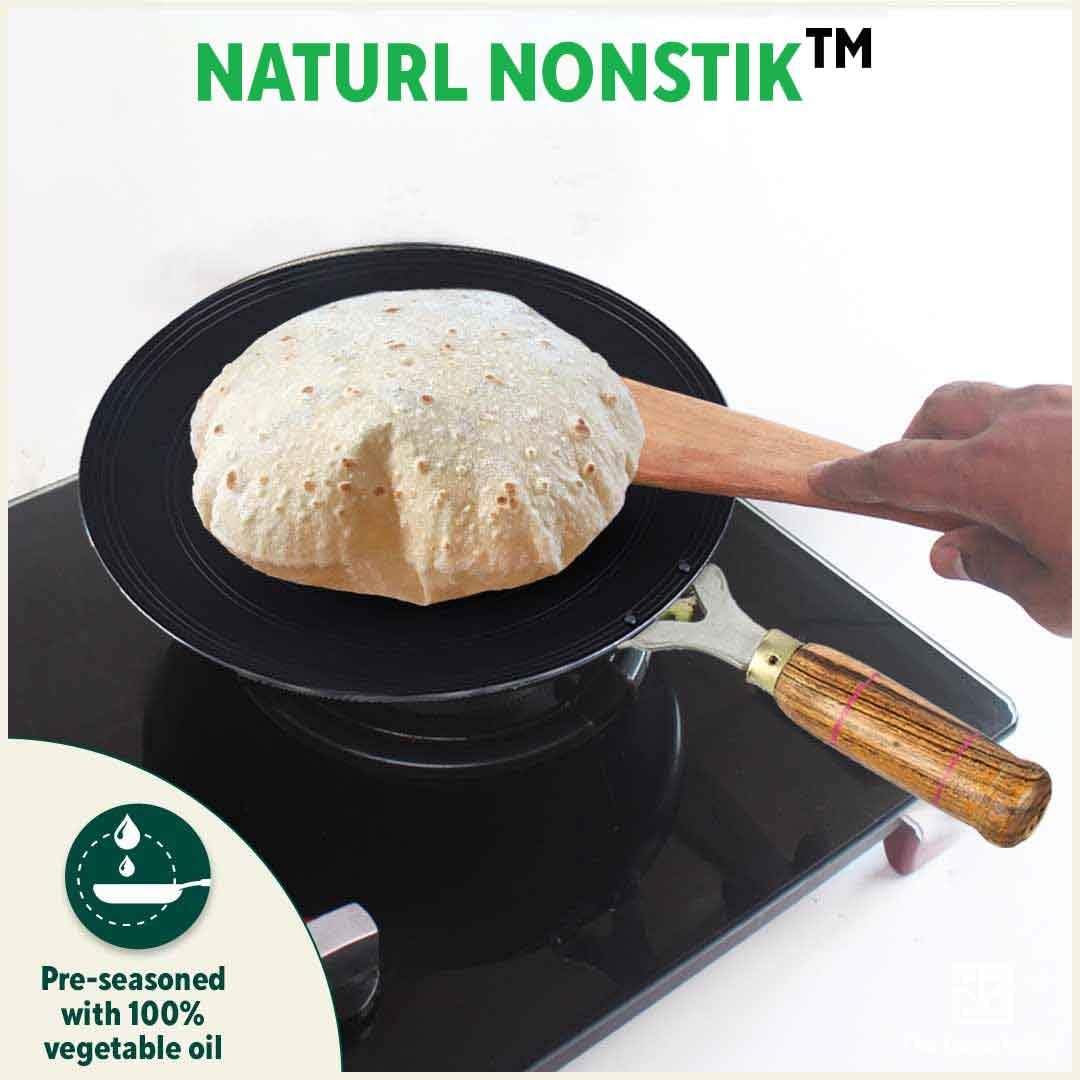 Pre-Seasoned Black Iron Tawa For Dosa, Chapathi With Wooden Handle - 27cm, 10.6 Inch, 0.95 Kg | Gas Stove Friendly, 100% Pure & Toxin-Free, No Chemical Coating Pre-Seasoned Black Iron Tawa For Dosa, Chapathi With Wooden Handle - 27cm, 10.6 Inch, 0.95 Kg | Gas Stove Friendly, 100% Pure & Toxin-Free, No Chemical Coating