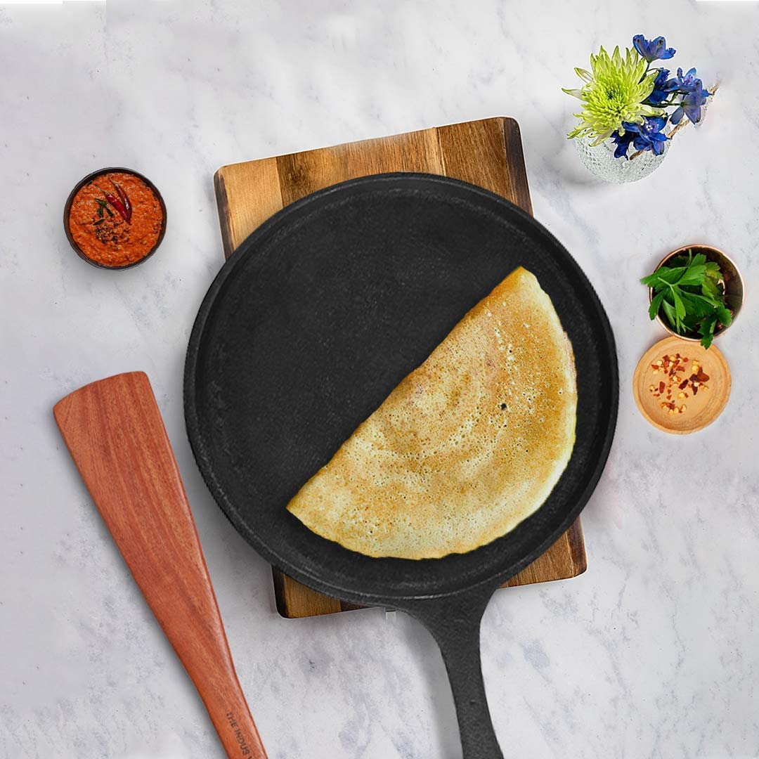 Pre-Seasoned Black Cast Iron Tawa With Free Wooden Spatula For Dosa, Chapathi - 25.7cm, 10.3 Inch, 2 Kg | Induction Friendly, Naturally Nonstick, 100% Pure & Toxin-Free, No Chemical Coating Pre-Seasoned Black Cast Iron Tawa With Free Wooden Spatula For Dosa, Chapathi - 25.7cm, 10.3 Inch, 2 Kg | Induction Friendly, Naturally Nonstick, 100% Pure & Toxin-Free, No Chemical Coating