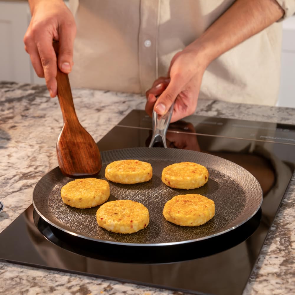 Stellar Stainless Steel Triply Non Stick Tawa 28 Cm | Etched Nonstick Tava - Rivet Less Double Wired Handle | Gas & Induction Base Stellar Stainless Steel Triply Non Stick Tawa 28 Cm | Etched Nonstick Tava - Rivet Less Double Wired Handle | Gas & Induction Base