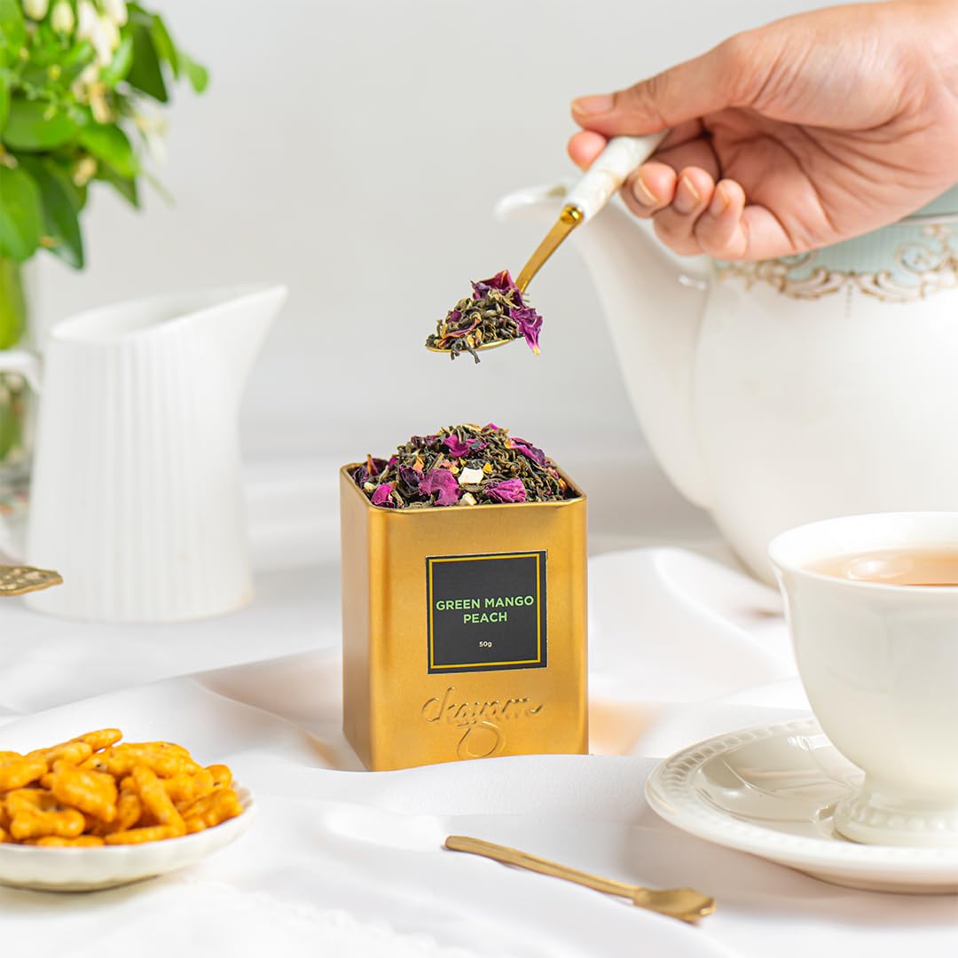 Chayam Mango Peach Green Tea - 50gm Tin, 1.7 Ounce | Exotic Blend With Peppermint & Rose Petals - Brew Hot Or Cold | Low Caffeine - Refreshing & Aromatic Green Tea Chayam Mango Peach Green Tea - 50gm Tin, 1.7 Ounce | Exotic Blend With Peppermint & Rose Petals - Brew Hot Or Cold | Low Caffeine - Refreshing & Aromatic Green Tea