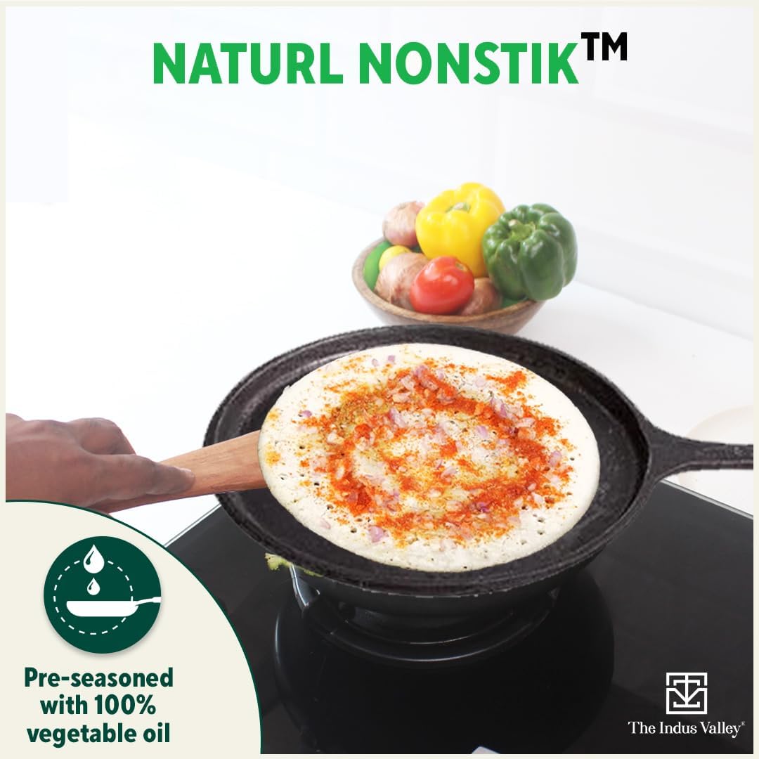 Pre-Seasoned Black Cast Iron Tawa With Free Wooden Spatula For Dosa, Chapathi - 25.7cm, 10.3 Inch, 2 Kg | Induction Friendly, Naturally Nonstick, 100% Pure & Toxin-Free, No Chemical Coating Pre-Seasoned Black Cast Iron Tawa With Free Wooden Spatula For Dosa, Chapathi - 25.7cm, 10.3 Inch, 2 Kg | Induction Friendly, Naturally Nonstick, 100% Pure & Toxin-Free, No Chemical Coating