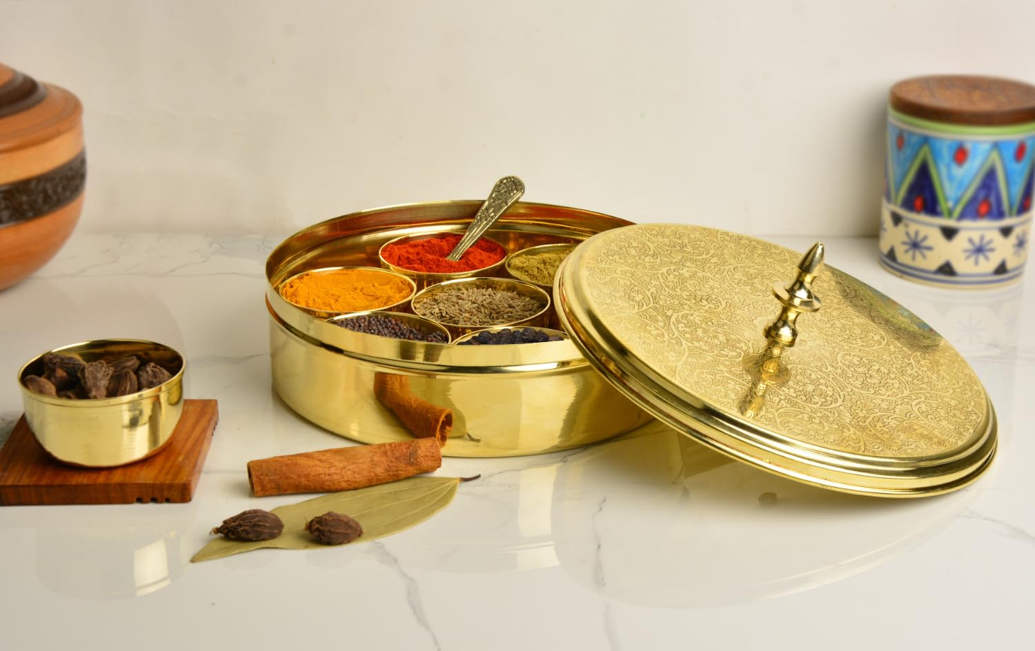 Premium Pure Brass Floral Etched Indian Spice Box For Kitchen With Spoon - 7 Containers, 80ml Each, Golden, Diameter - 7.2 Inches, Weight - 850gm | Peetal Masala Dani, Masala Dabba Premium Pure Brass Floral Etched Indian Spice Box For Kitchen With Spoon - 7 Containers, 80ml Each, Golden, Diameter - 7.2 Inches, Weight - 850gm | Peetal Masala Dani, Masala Dabba