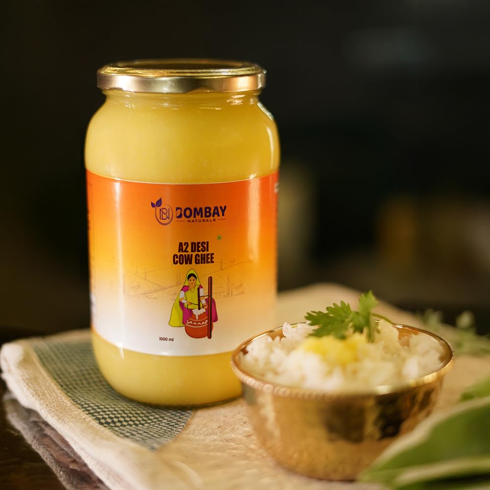 100% Pure A2 Desi Cow Ghee By Bombay Naturals | Traditional Vedic Bilona Method Healthy Nutrients Desi Ghee Good For Good For Bone & Joint Health | (1 Litre) 33.8 Ounce | Jar Pack