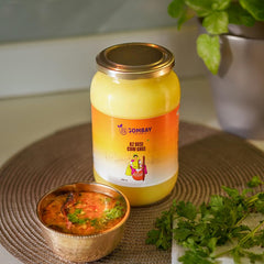 100% Pure A2 Desi Cow Ghee By Bombay Naturals | Traditional Vedic Bilona Method Healthy Nutrients Desi Ghee Good For Good For Bone & Joint Health | (1 Litre) 33.8 Ounce | Jar Pack