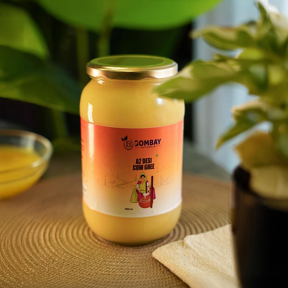100% Pure A2 Desi Cow Ghee By Bombay Naturals | Traditional Vedic Bilona Method Healthy Nutrients Desi Ghee Good For Good For Bone & Joint Health | (1 Litre) 33.8 Ounce | Jar Pack